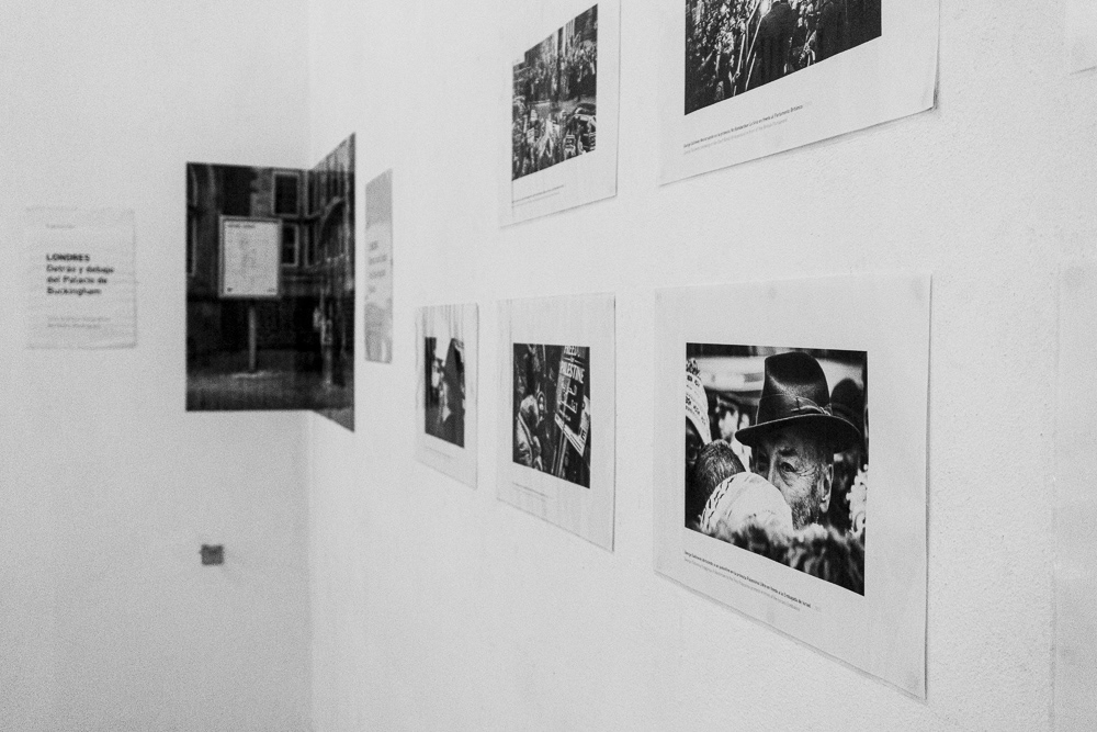 Picture of the frames on the exhibition wall with the caption cheap black and white laser printing, A3 hot laminating and a ridiculous amount of blue-tack in action!  gallery arte soy in santiago de cuba, cuba. 2015  © Pedro Rodrigues